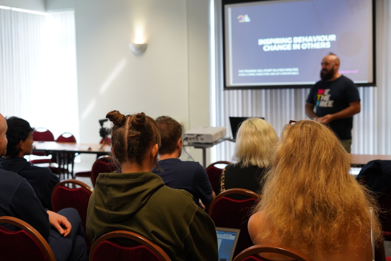 WTF volunteers attending a training session