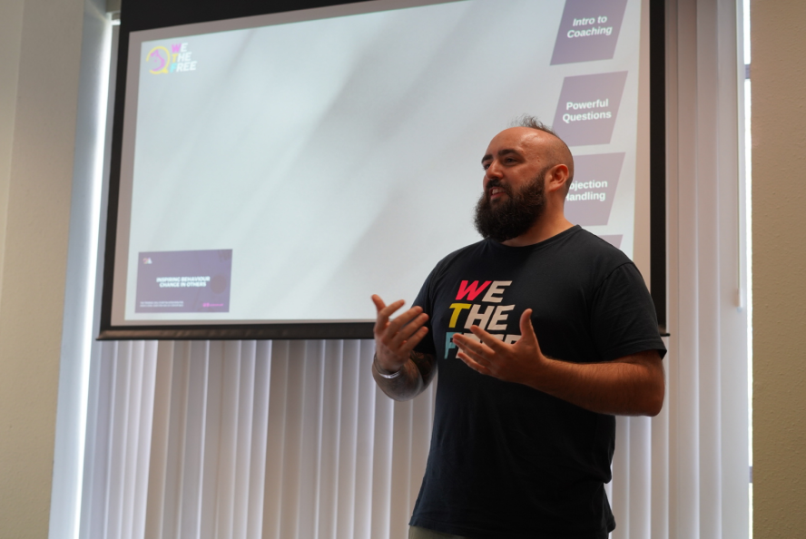 A WTF volunteer presenting during a training workshop